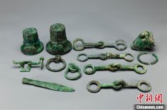 湖北新发现春秋时期楚墓 出土完整青铜礼器群