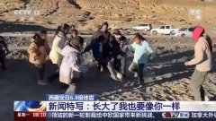 “长大了我也要像你一样” 震区的她拿话筒说出
