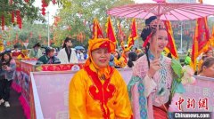 （新春走基层）海口古韵新风年味浓 换花祈福喜